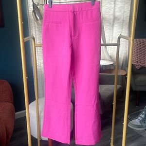Unworn vici pink cropped flared trouser in size small